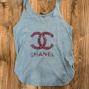 Woman’s Size Small Dusty Blue Next Level Apparel Tank With Side Slit Details.